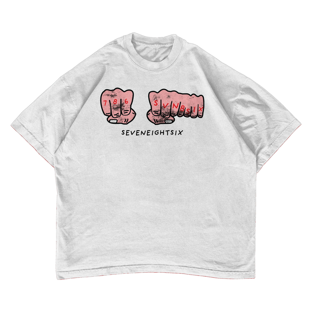 White t-shirt with red graphic design on a white background