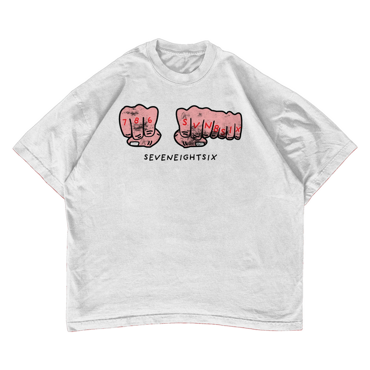 White t-shirt with red graphic design on a white background